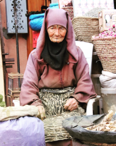 Elderly lady selling spices