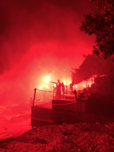Red flares at night along Hvar coast