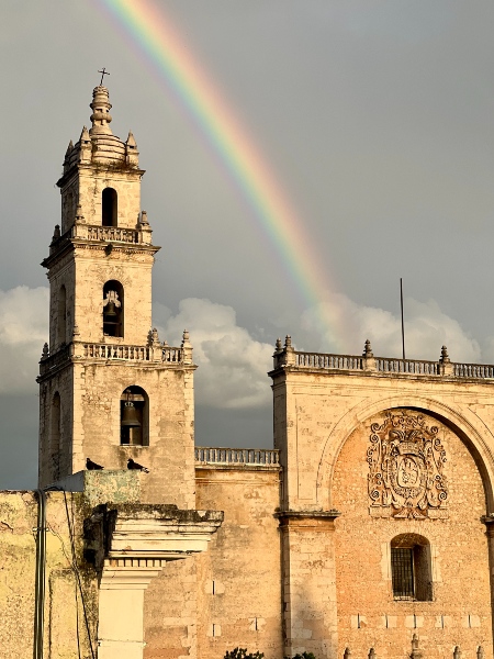church with rainbow in Merida plaza grande