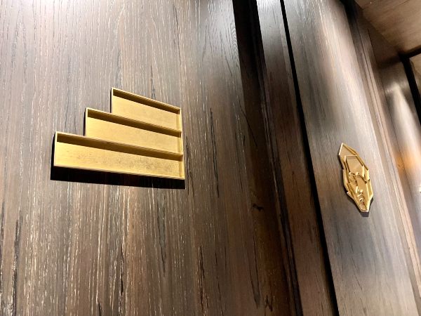 Brass icons in foyer at Pendry hotel